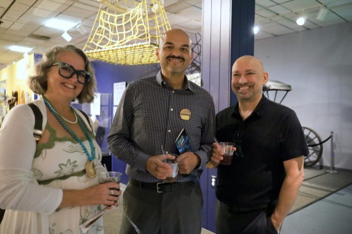 Guests mingling with drinks at a past Geek Gala